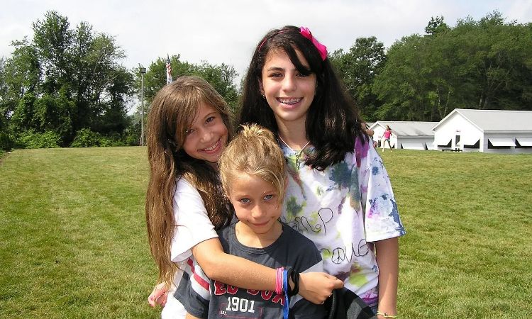 An old picture of Odessa A'zion (middle) with her older sister Gideon Adlon (left) and friend, Jessie Bodner in Jewish Summer Camp. 